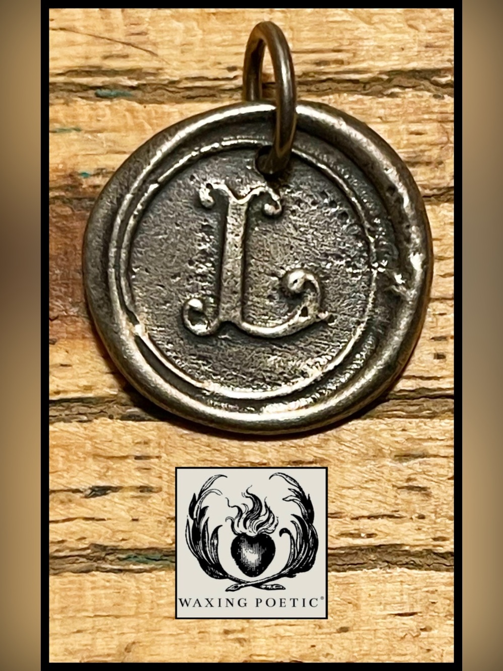 Waxing Poetic Sterling Silver “L” Charm.